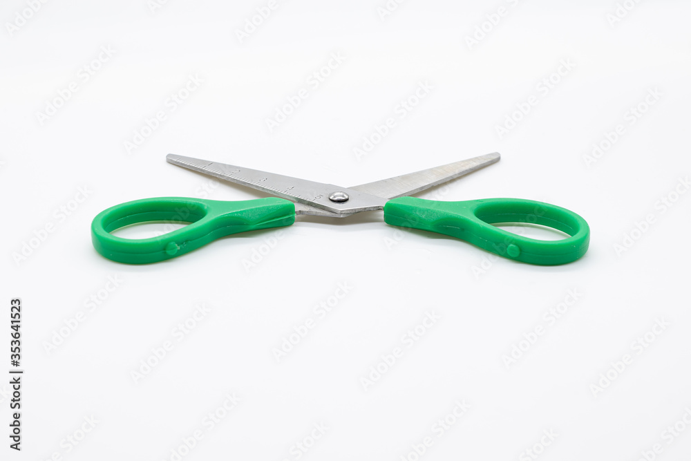 Yellow scissors with ruler isolated on white background Yellow scissors with ruler isolated on white background