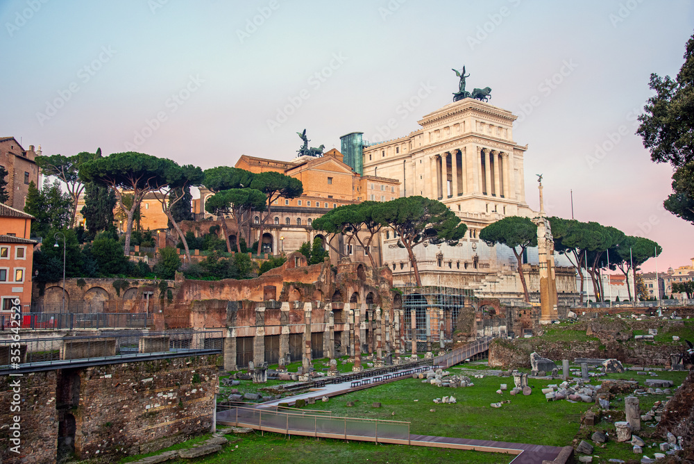 The famous ruins of the Roman Forum  and the Victor Emmanuel II National Monument in Rome, Italy, early in the morning