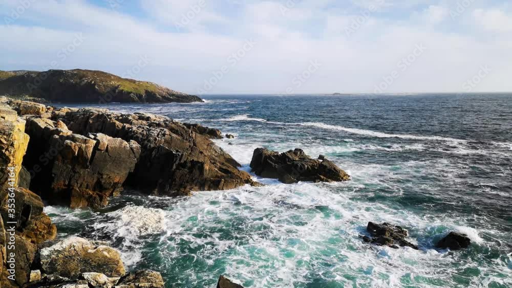 Moody skiies over the sea at Hushinish on the north coast of the Isle of Harris in the Outer Hebrides of Scotland Moody skiies over the sea at Hushinish on the north coast of the Isle of Harris in the Outer Hebrides of Scotland