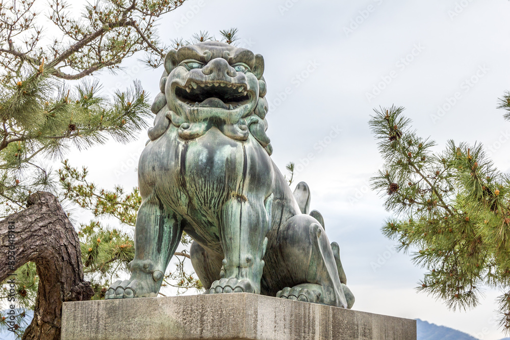 Bronze lion guardian statue in Miyajima island, Japan
