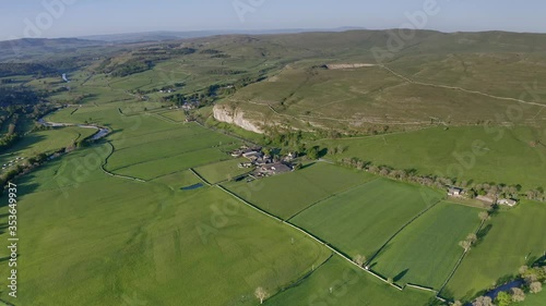 An aerial view of the Wharfedale valley, on the right is the limestone outcrop of Kilnsey crag, and the River Skirfare, right joins the River Wharfe photo