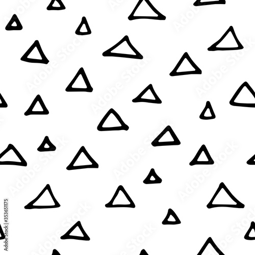 Seamless neutral pattern. Black hand-drawn triangles isolated on white background. Scandinavian cozy ornament. Vector geometric shapes illustrations for wallpaper, posters, wrapping paper, textiles