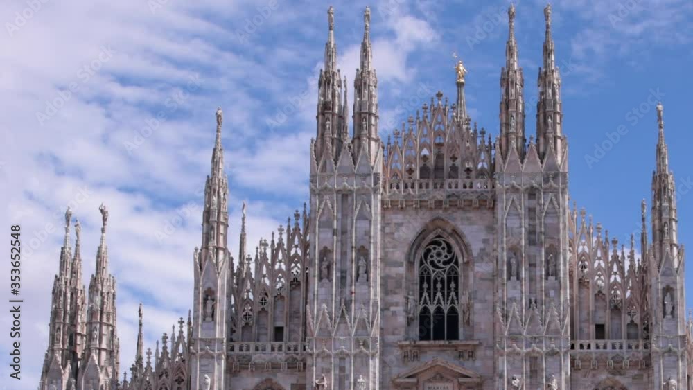 Timelapse view of Milan, Italy with Duomo square and cathedral. Italian city landscape in Milano, Italia with art and world famous religious monument Timelapse view of Milan, Italy with Duomo square and cathedral. Italian city landscape in Milano, Italia with art and world famous religious monument