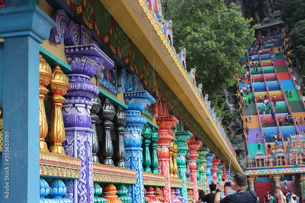 Religious statues and colorful stairs going towards Batu Cave