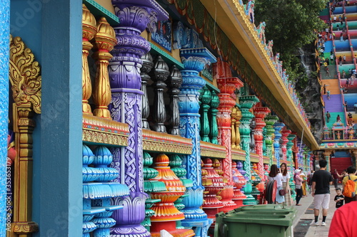 Religious statues and colorful stairs going towards Batu Cave