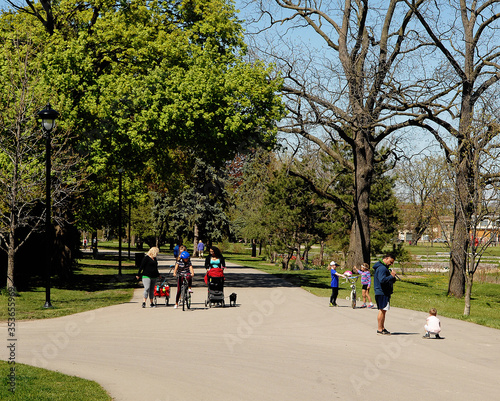 Families walking in a park