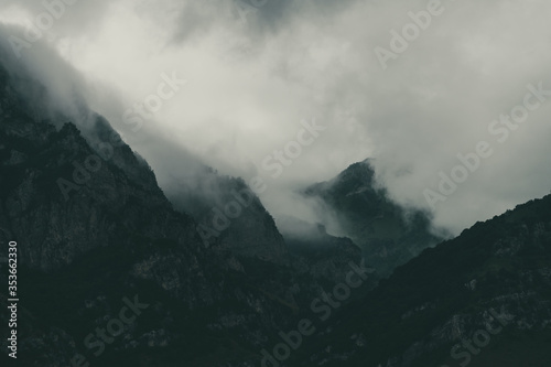 Fototapeta Naklejka Na Ścianę i Meble -  Foggy Caucasus mountains on the Georgian-Russian border.