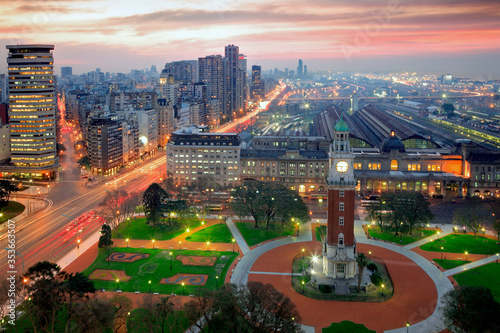 Aerila view of Buenos Aires city at twilight, with train station and historic tower with clock. photo