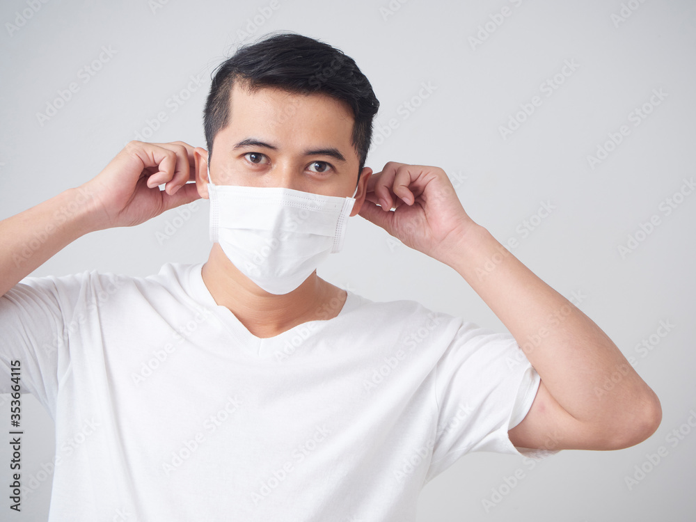 Young man in protective medical mask.