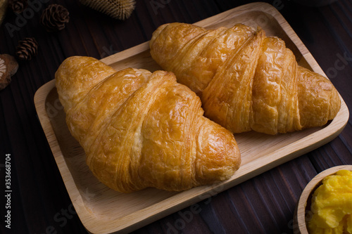 Close up freshly croissants breakfast  on wooden background 