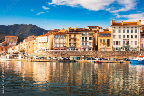 France, Port-Vendres, 8 November 2019: Picturesque facades of houses stretching along Francois Joly quay