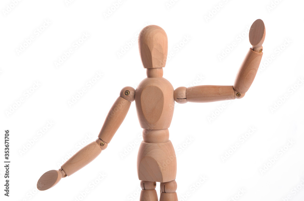 Wooden figure mannequin posing in action isolated on white background. Wooden figure mannequin posing in action isolated on white background.