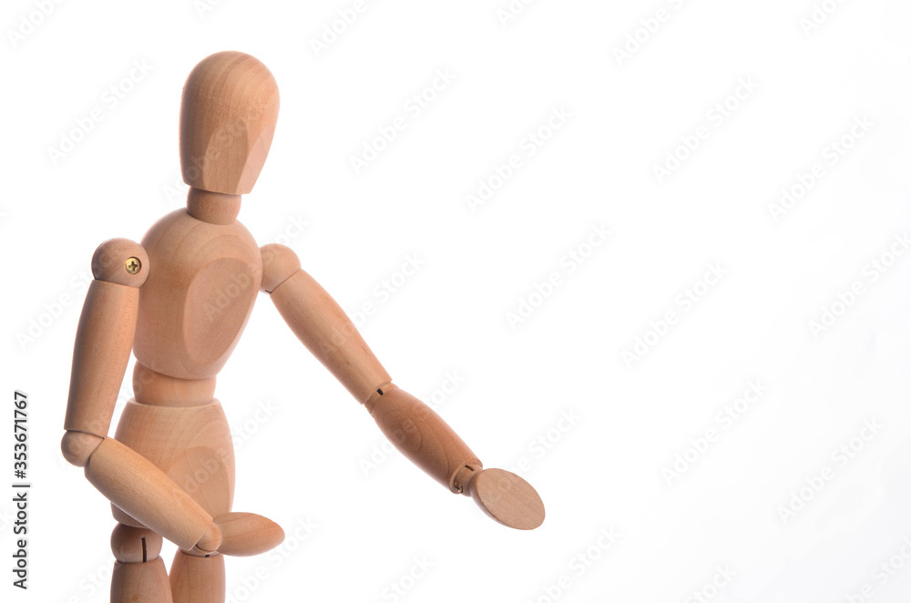 Wooden figure mannequin posing in action isolated on white background. Wooden figure mannequin posing in action isolated on white background.