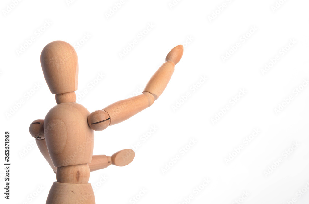 Wooden figure mannequin posing in action isolated on white background. Wooden figure mannequin posing in action isolated on white background.