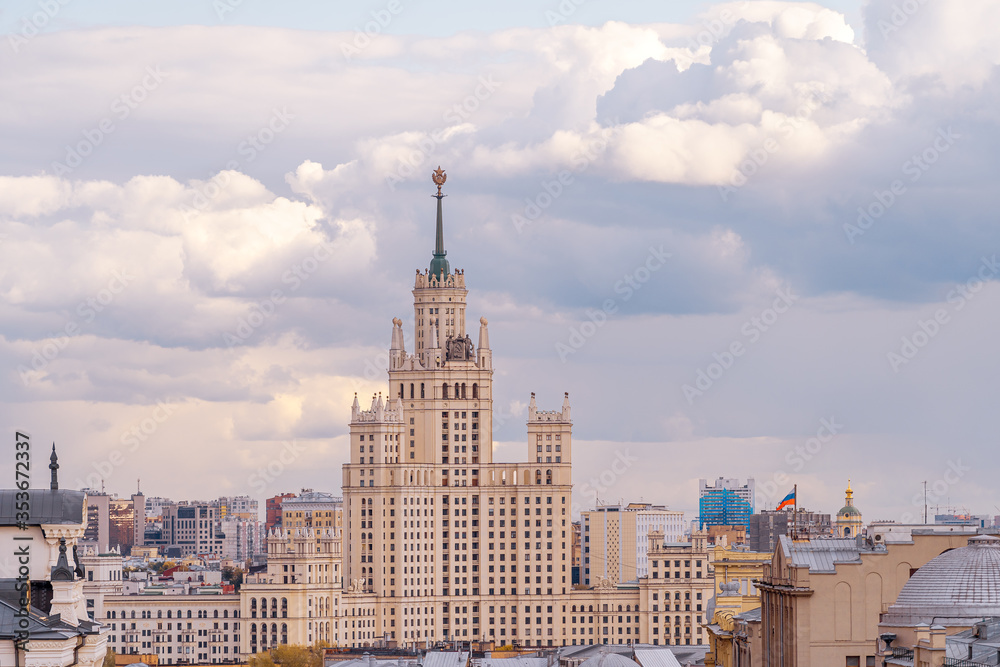 Stalin's skyscraper in Moscow. High-rise on Kotelnicheskaya embankment in the panorama of the city. City landscape in cloudy weather. Stalin's skyscraper in Moscow. High-rise on Kotelnicheskaya embankment in the panorama of the city. City landscape in cloudy weather.
