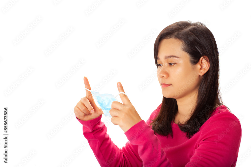 Young asian woman wearing an anti virus protection mask Young asian woman wearing an anti virus protection mask