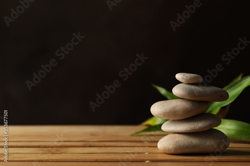 Stones on the bamboo background. Zen concept
