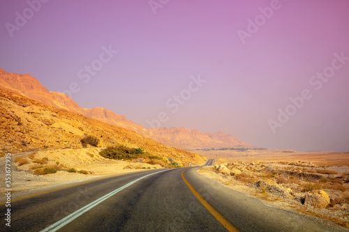 Driving a car on mountain Israel road. Desert landscape. Journey by car. View from the car of a mountain landscape in the morning. Israel