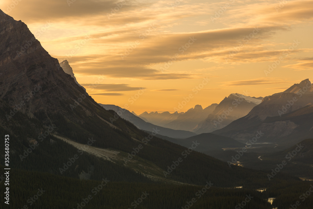 Beautiful sunset in dramatic landscape over the Icefields Parkway in Banff National Park, Canada