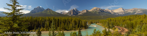 Morants Curve where the Canadian Pacific Railway runs along the stunning Bow River with the beautiful Canadian Rockies in the background, Banff National Park, Alberta, Canada
