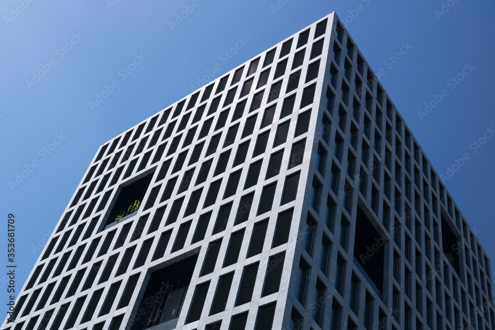 Office building on a background of blue sky. Office building on a background of blue sky.