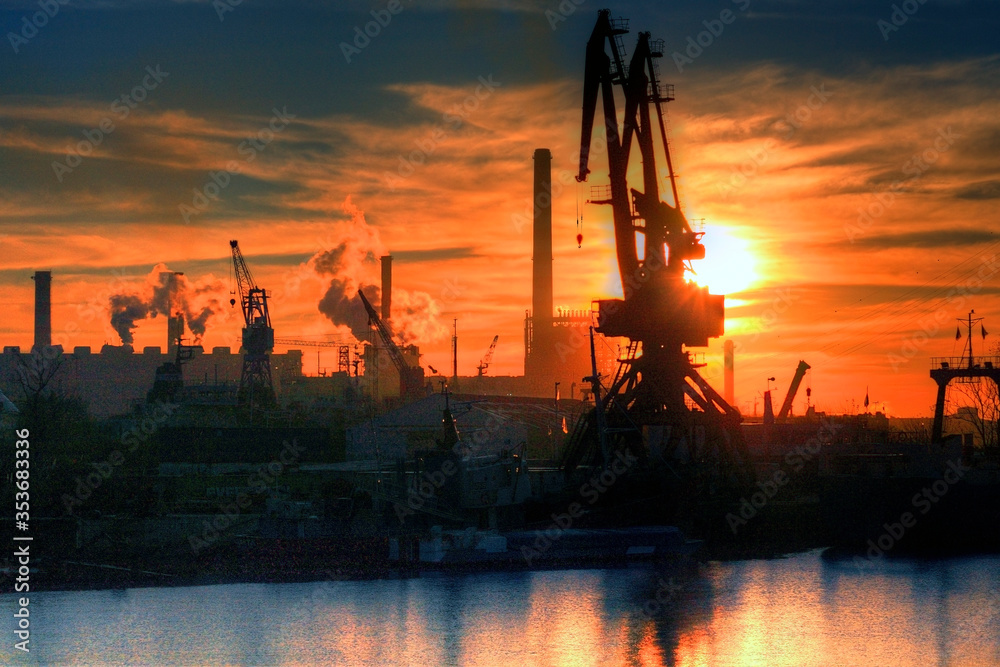 Industrial area with cranes and chimenies, in the port of Buenos Aires.