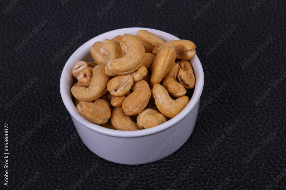 Cashew nuts heap in the bowl Cashew nuts heap in the bowl