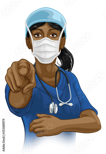 Photo A woman nurse or doctor in surgical or hospital scrubs and mask pointing in a your country needs or wants you gesture