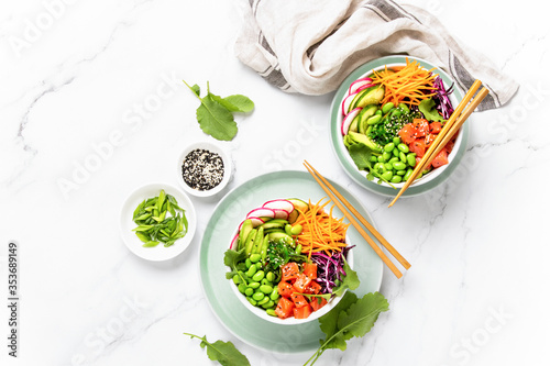 Salmon poke bowl, top down view photo