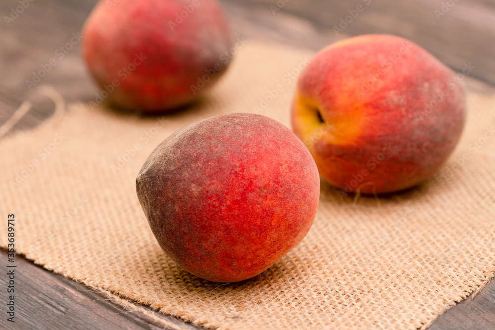 Fresh peaches on the garden table Fresh peaches on the garden table