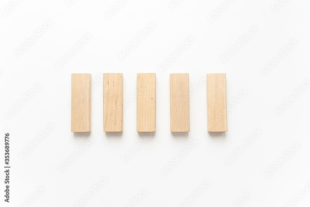 wooden bars lie on a light background wooden bars lie on a light background
