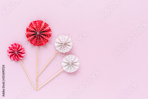 Red and white paper fan wit...