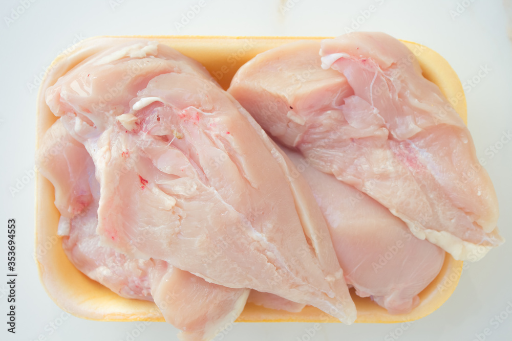 Chicken fillet and meat for a healthy diet. Cooking diet meat, concept of slimming and gaining muscle mass