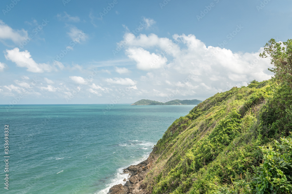 view at the sea with blue sky and white clouds, from the hillside of Koh Samet 
