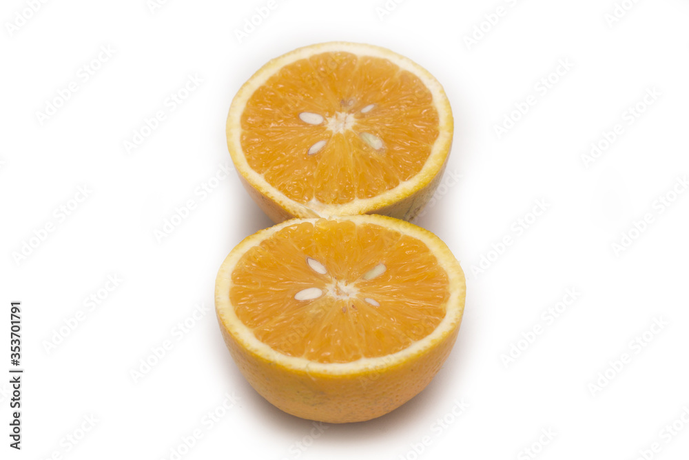 Orange fruit with orange slices and leaves isolated on white background. Orange fruit with orange slices and leaves isolated on white background.