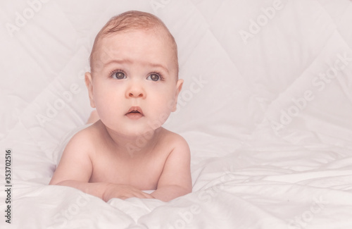 Sweet little baby boy portrait on white background