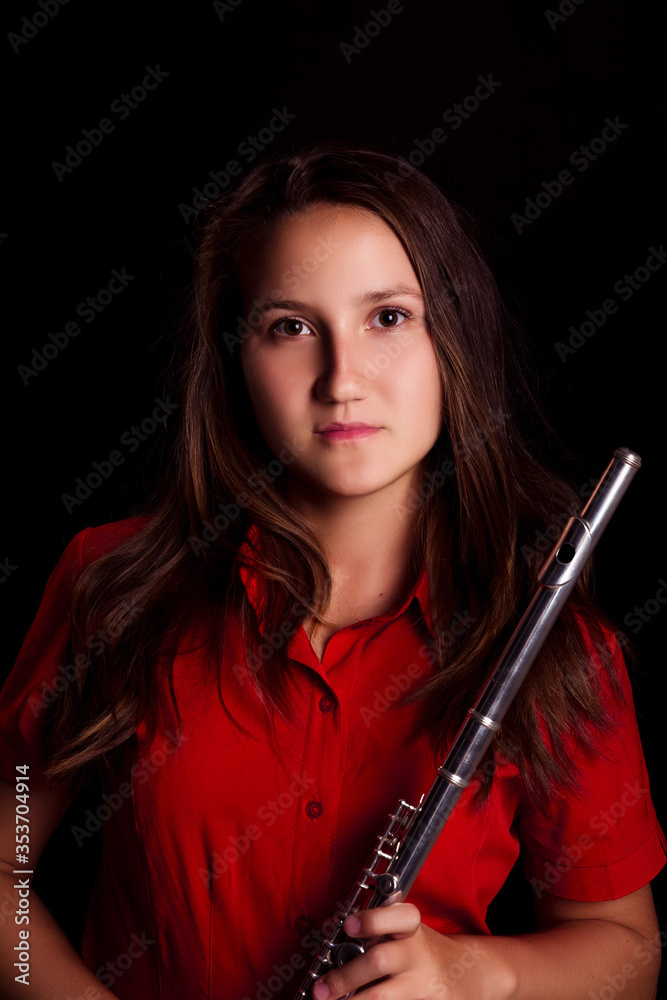 Portrait of a girl who knows how to play the flute Portrait of a girl who knows how to play the flute