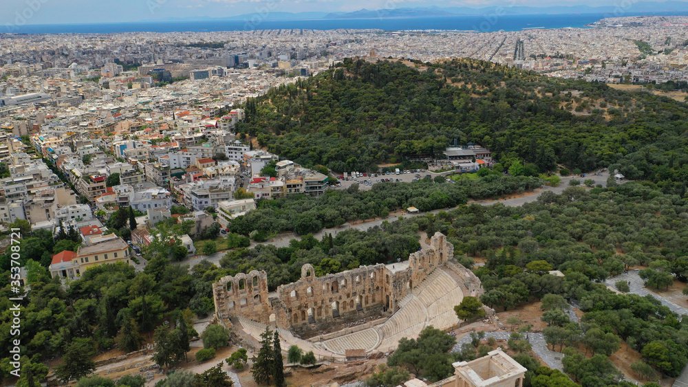 Aerial drone photo of Odeon of Herodes Atticus a stone theatre structure located on the southwest slope of the Acropolis of Athens, Attica, Greece