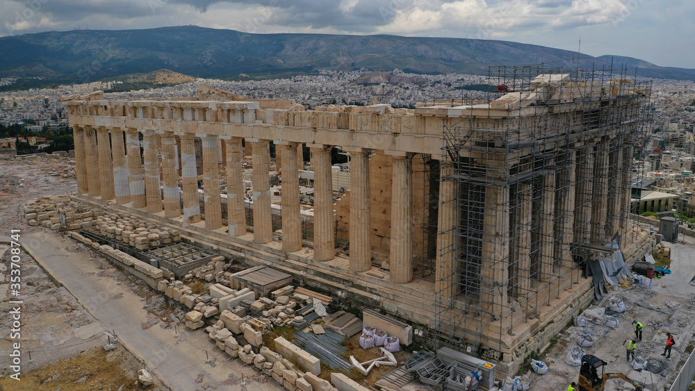 Aerial drone close up photo showing reconstruction being made by workers on iconic Parthenon marble temple, Acropolis hill, Athens, Attica, Greece