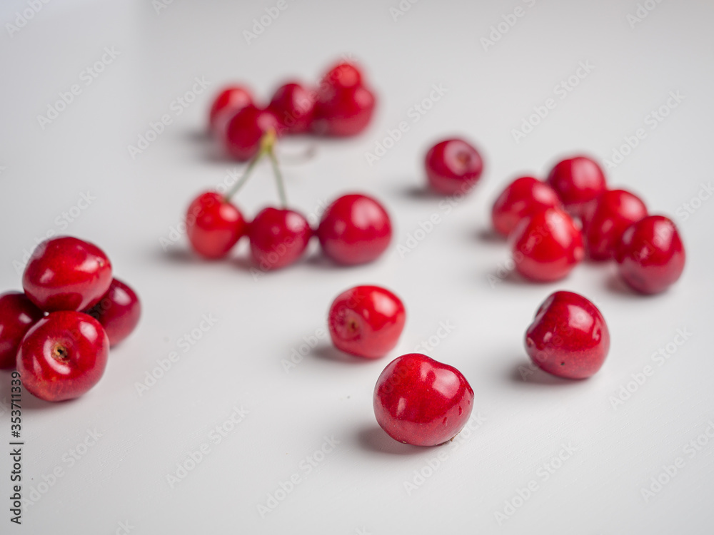 Sweet red cherries on white Sweet red cherries on white