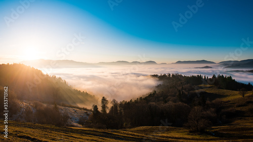 Obraz na plátně Sunset over the cloud sea in the Vosges