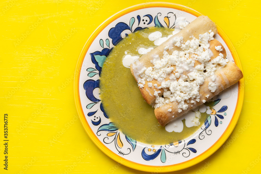 Mexican drowned flautas with green sauce also called Mexican drowned flautas with green sauce also called