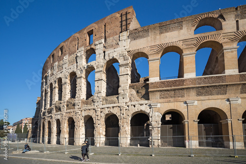 Tourists visit Colosseum ruins in Rome. It is the greatest roman building in the world.