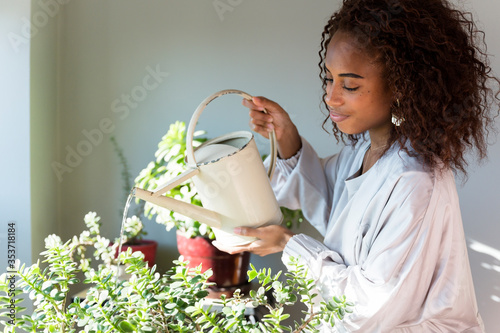 Woman watering plants