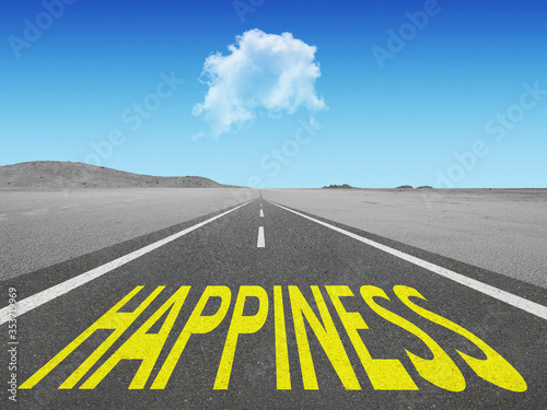 Happiness text on road to future.