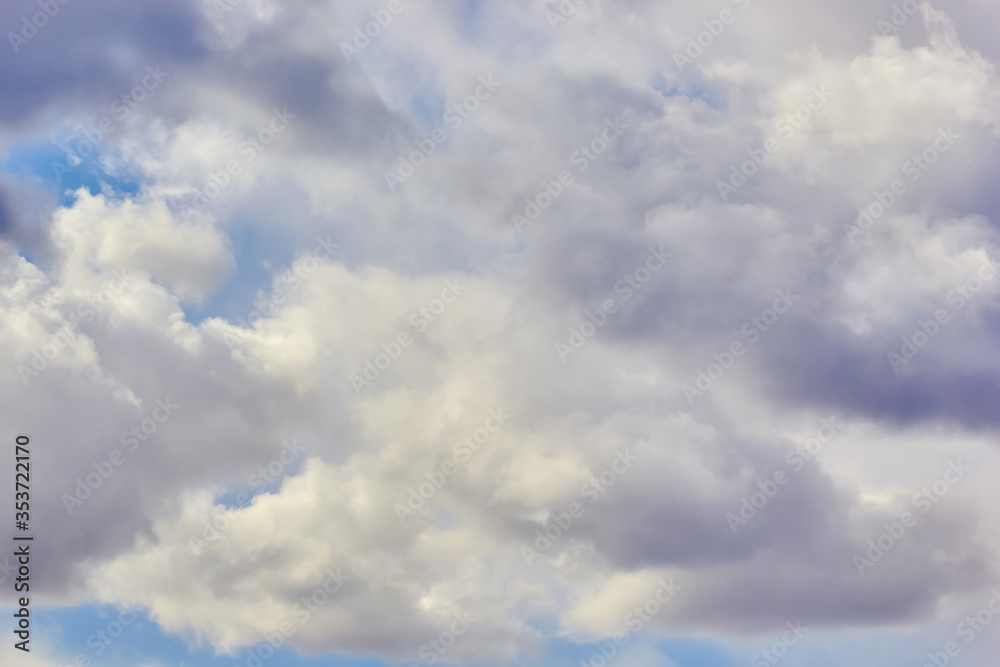 texture of fluffy clouds against a blue sky and fresh air