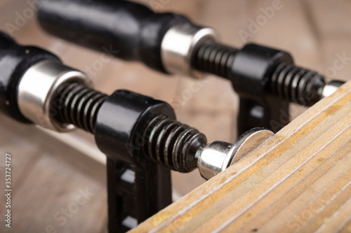 Papier peint Carpentry clamp used for gluing wood