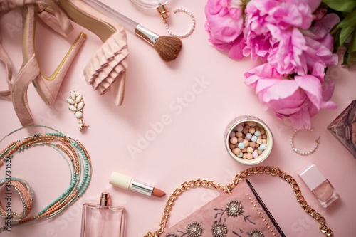 Fashion women stylish accessories outfit composition. Pink pastel background with copy mock up space