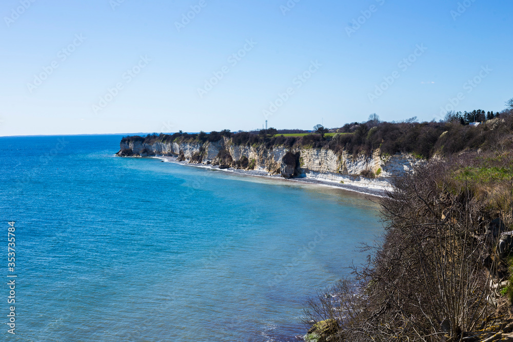 Views of Stevns Klint which is a white chalk cliff in Denmark in spring. Included in UNESCO World Heritage. Danish landscape.