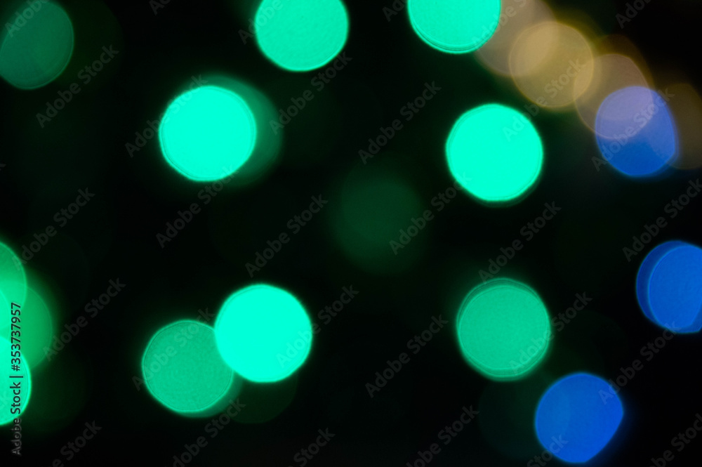 Background lights in defocus of different colors.